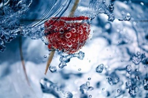 Featured Topic Image A Lone Raspberry Toothpick Skewered Plunged Into Water Quickly Bubbling Around.